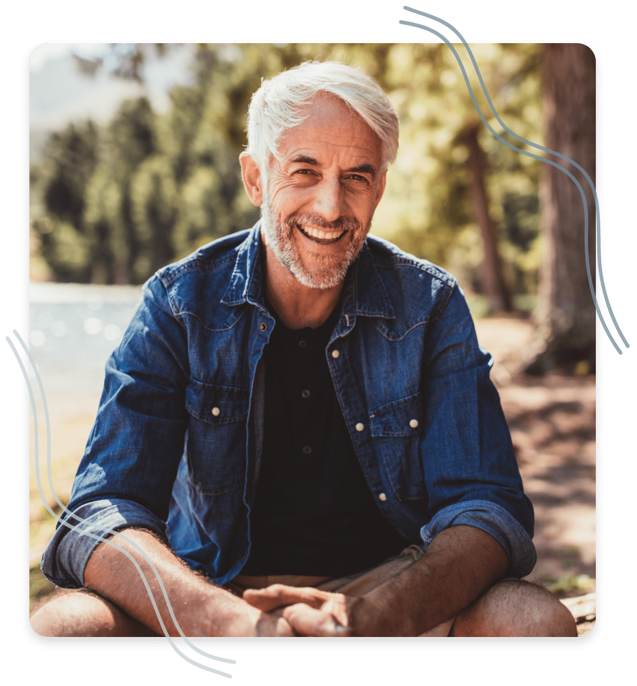 Dental-Implants-Cheney-3 senior man smiling at camera after receiving dental implants